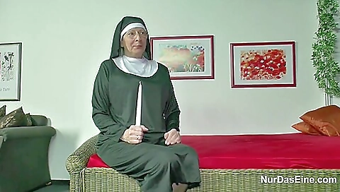 German Nun With Priest In Church